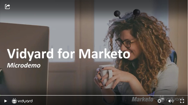 A screenshot of a Vidyard video presentation featuring a stock image of a young woman with curly hair holding a coffee cup. The title of the presentation on the screen is "Vidyard for Marketo"