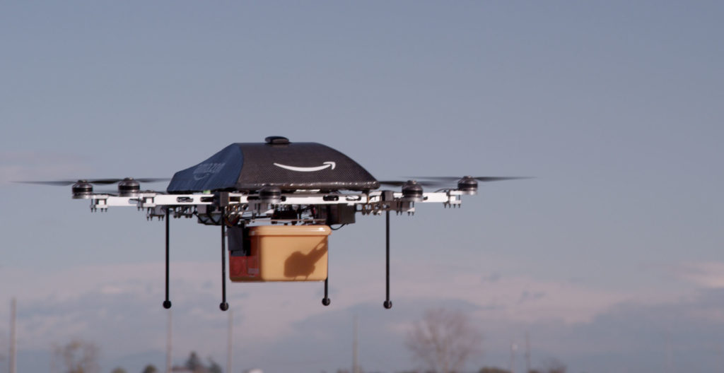 an Amazon drone carries a package