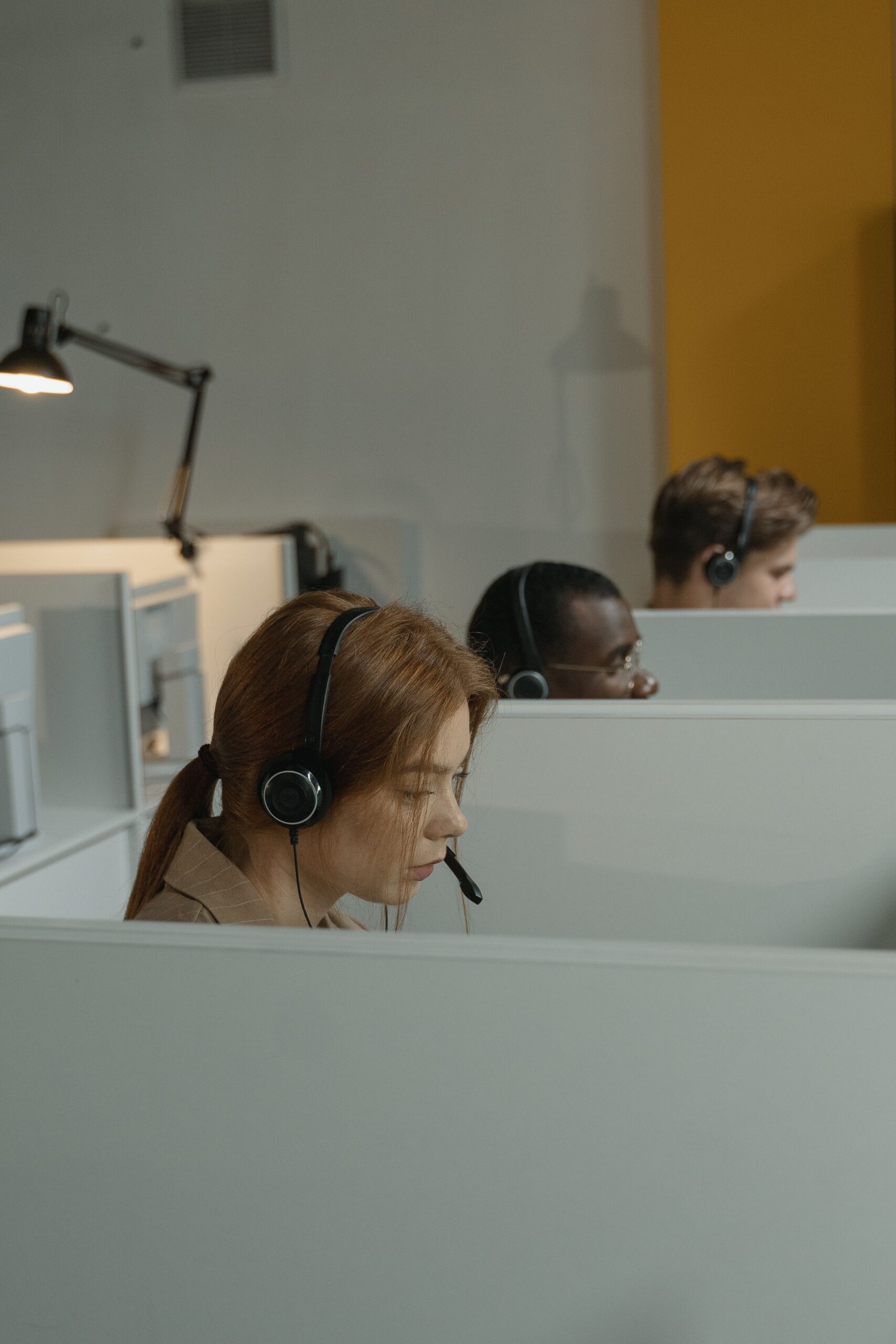 BDRs in cubicles on calls